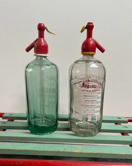 Vintage French + Spanish Soda Bottles with great graphics !