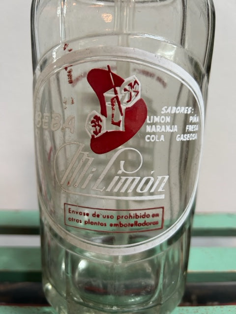 Vintage French + Spanish Soda Bottles with great graphics !